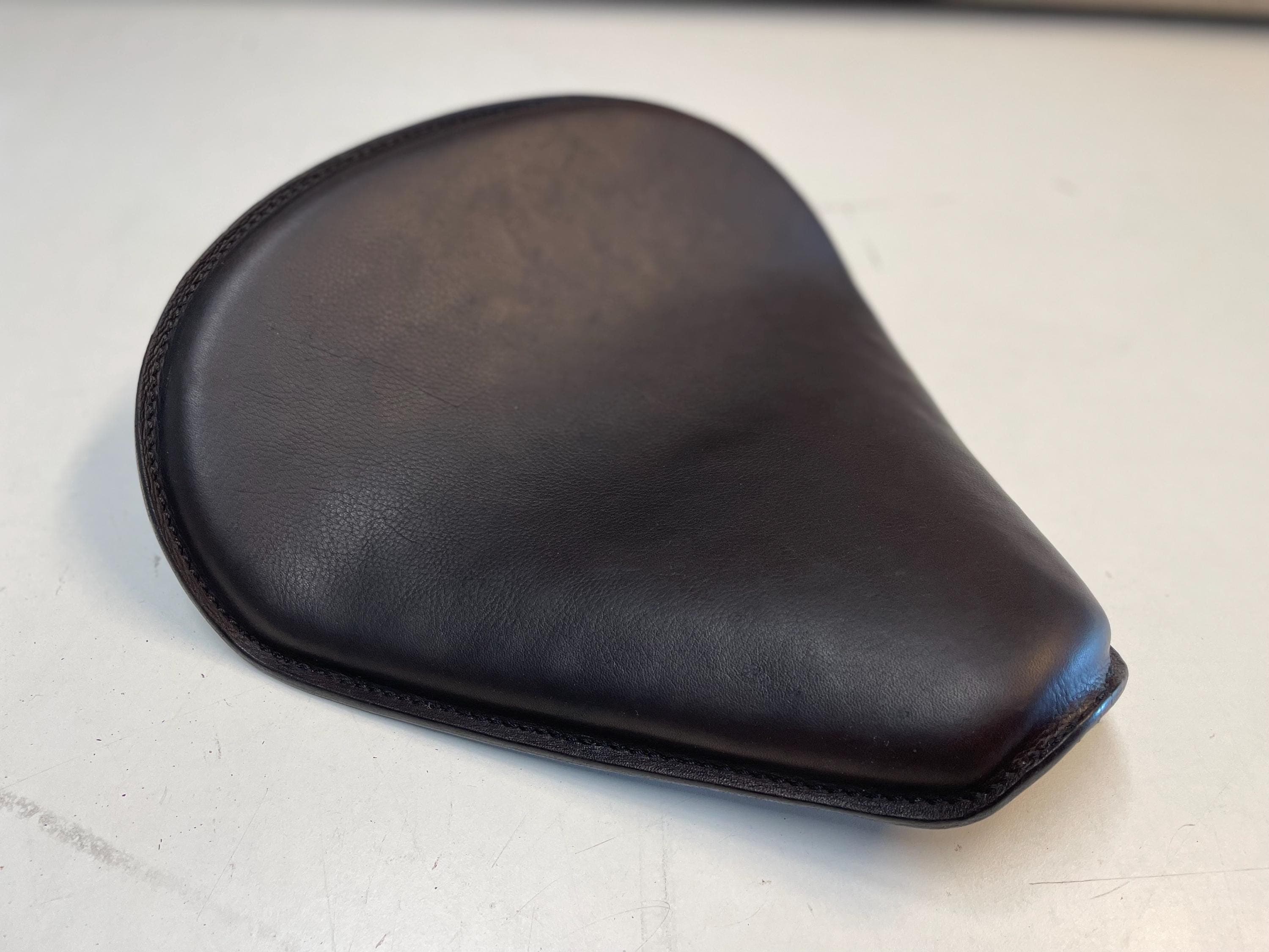 Covers for motorcycle seats