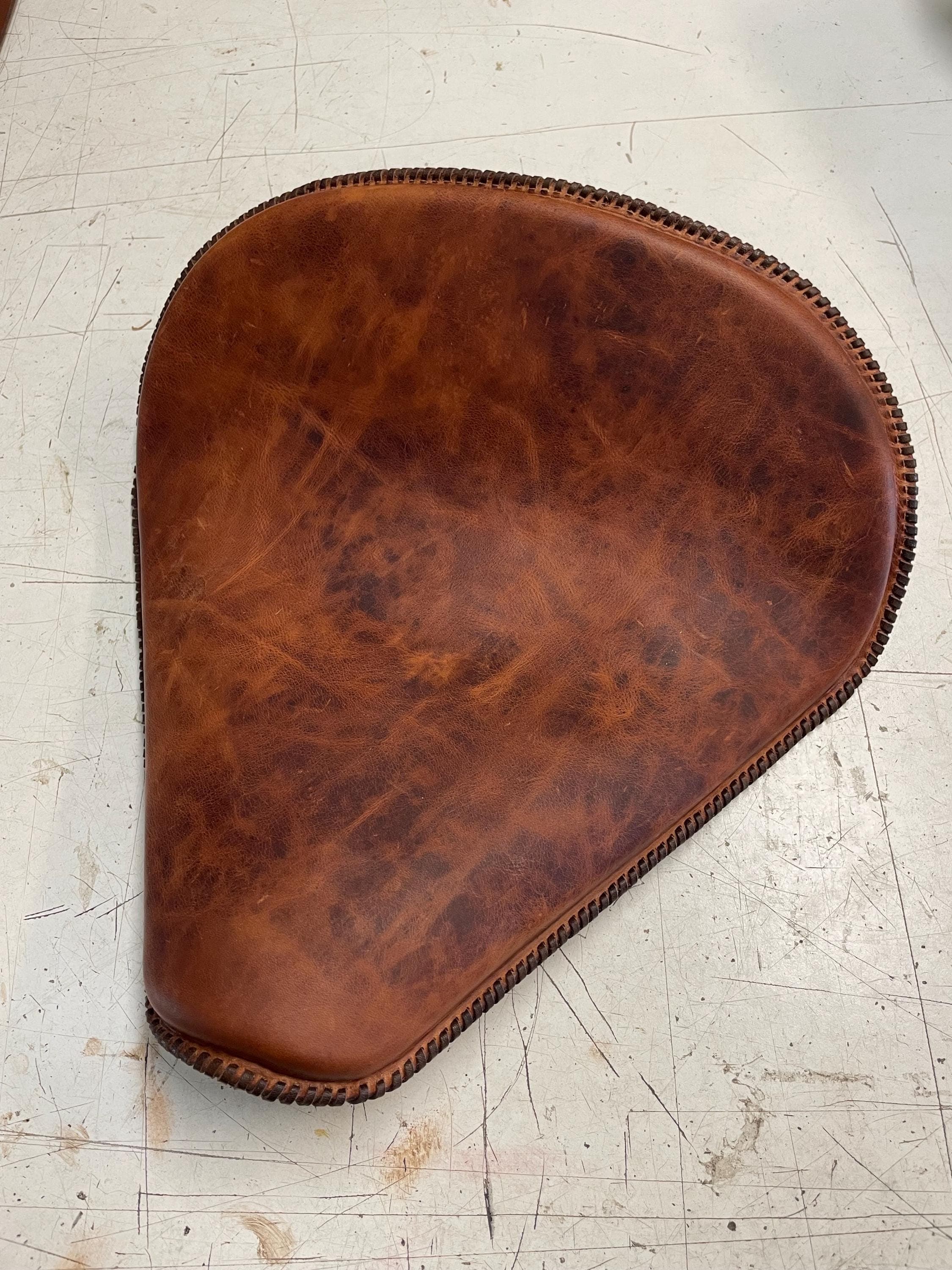 Covers for motorcycle seats